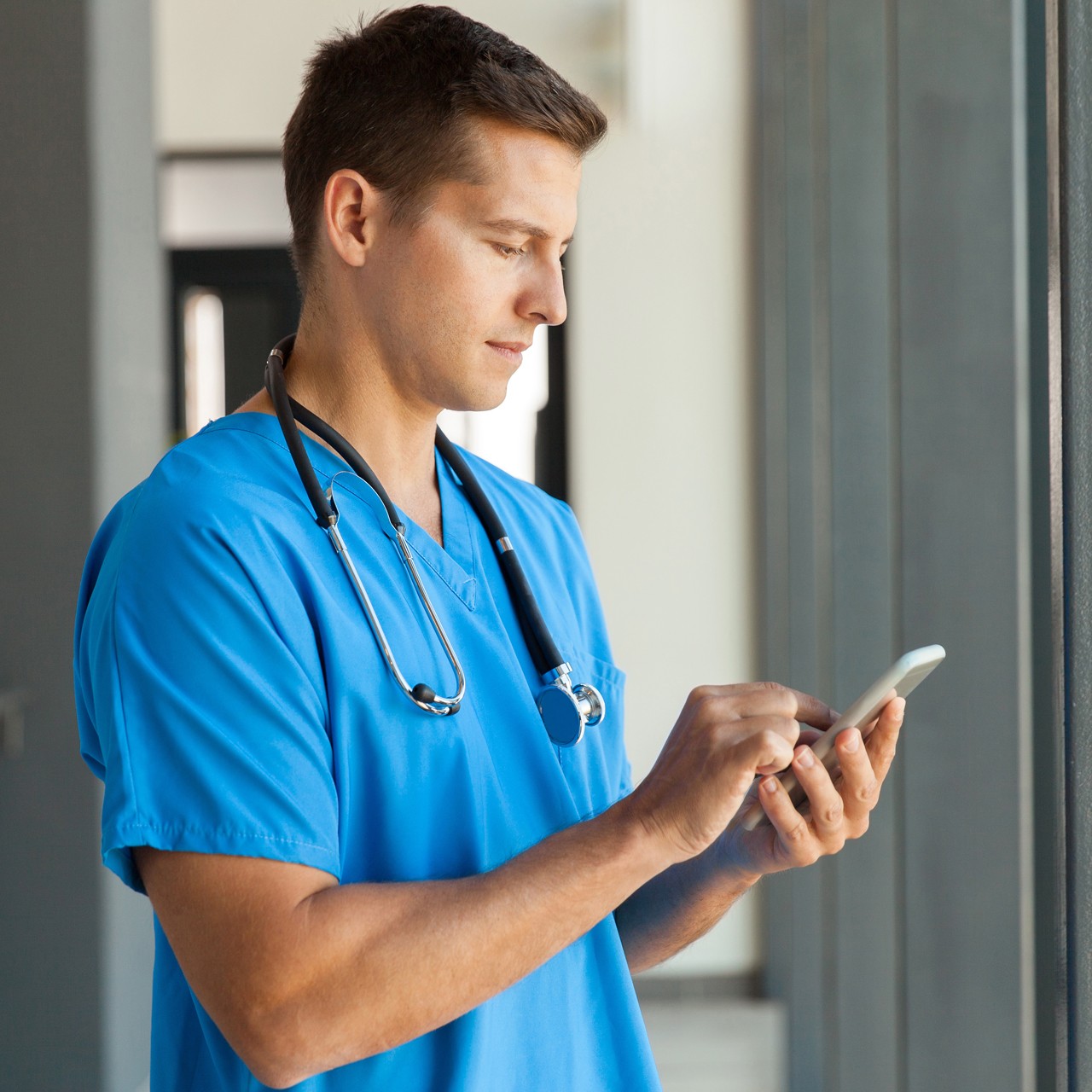 medical professional using smart phone