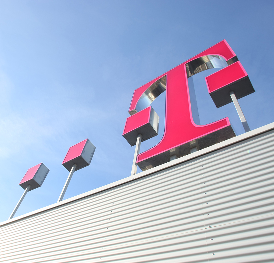 Logo of Deutche Telekom on top of a building