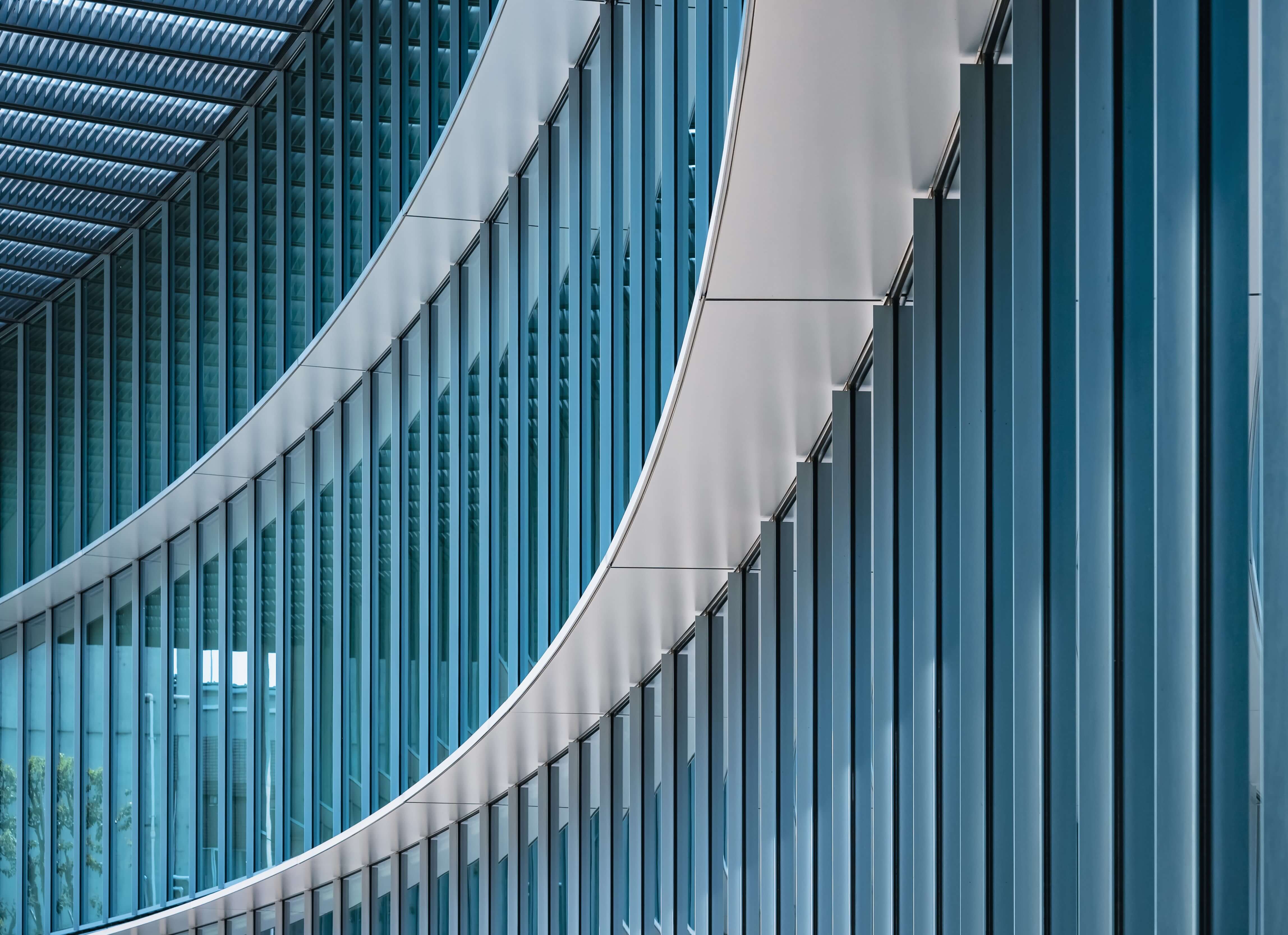 Architecture detail Modern Building Glass facade wall curve pattern Exterior
