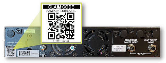 Rear panel of device with QR code and claim code labeled SAMPLECODELABEL FFFFFF 123456 for registration. Main power input labeled +12 VDC and redundant power input for backup. Cooling fan and various ports visible.