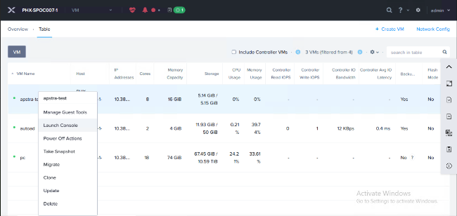 User interface for managing virtual machines, displaying VM details like name, host, IP addresses, CPU cores, memory, storage, usage metrics, and management options such as manage tools, launch console, power off, snapshot, migrate, clone, update, and delete.