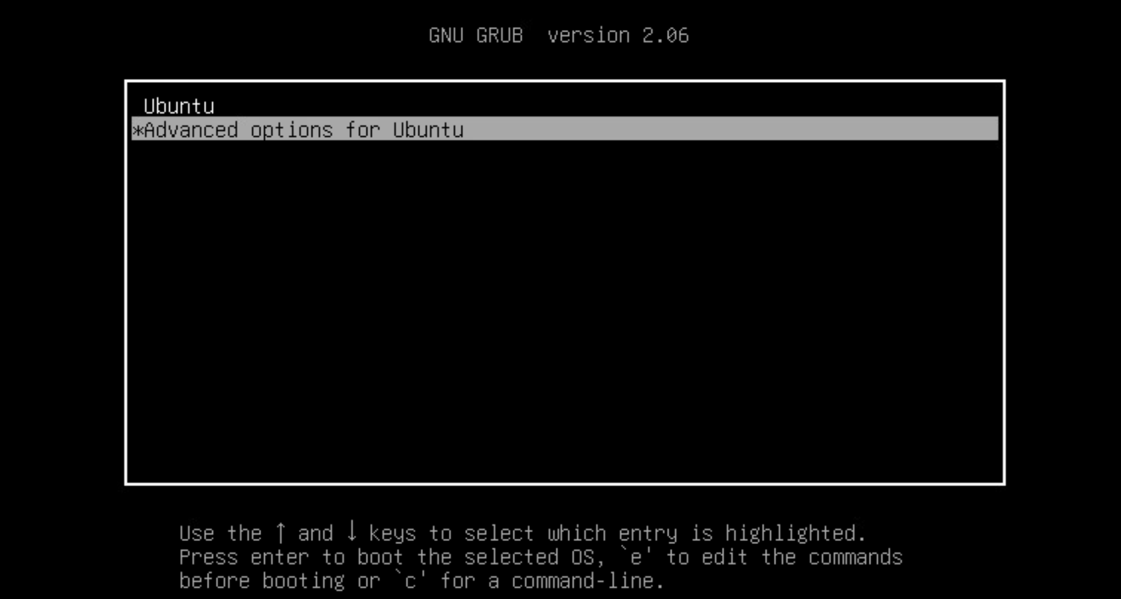 GNU GRUB menu version 2.06 with options Ubuntu and Advanced options for Ubuntu. Instructions for navigation and boot commands.