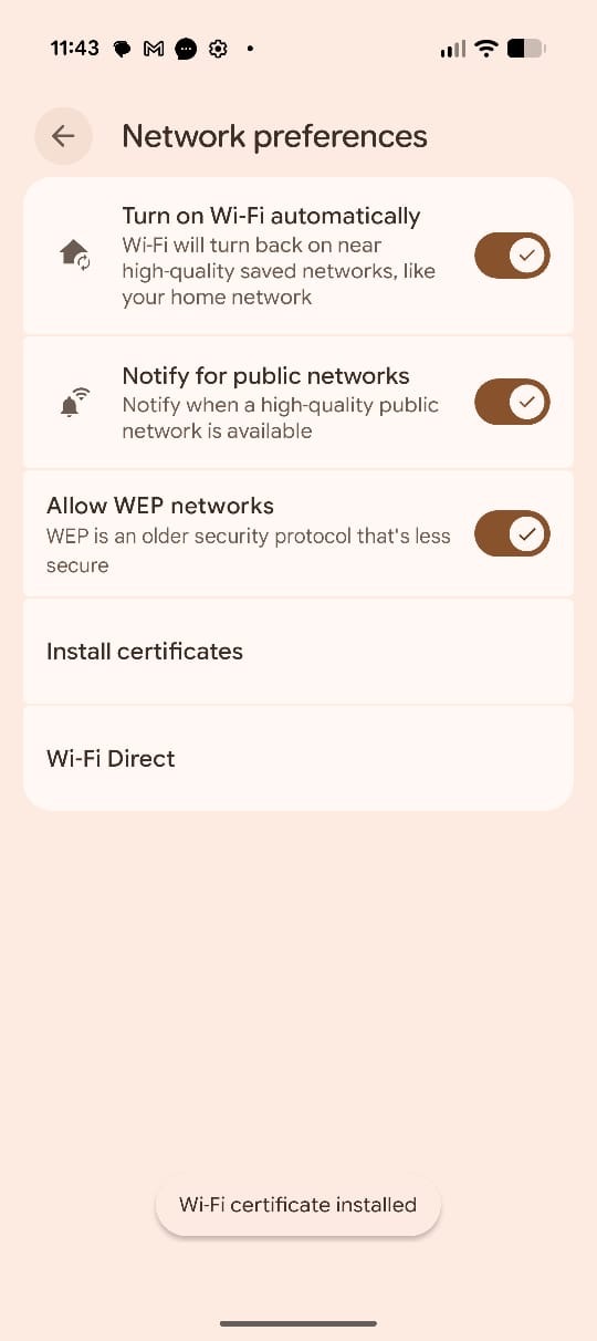 Smartphone screen showing Network preferences menu with options for enabling Wi-Fi auto-on, public network notifications, WEP networks, installing certificates, Wi-Fi Direct, and a message about installed Wi-Fi certificate.