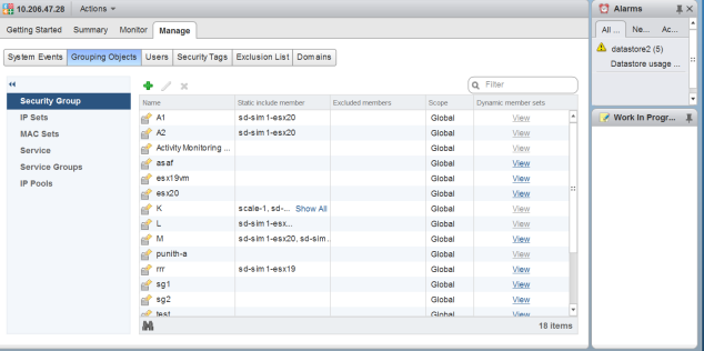 Network management interface showing Security Group details under Manage tab. Lists security groups with names, members, scope, and member sets. Left sidebar includes IP Sets, MAC Sets, Service, Service Groups, IP Pools. Right sidebar shows Alarms and Work in Progress sections.