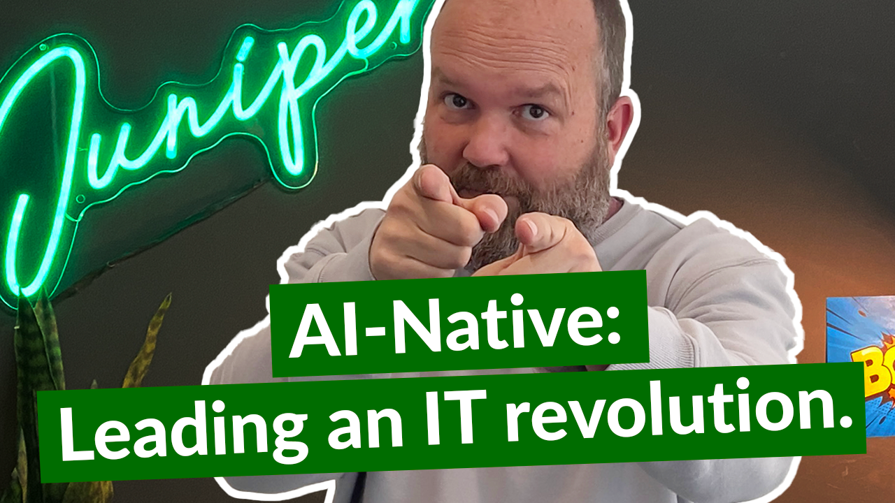 “Juniper” is in the top left corner in cursive. The middle of the image shows a man pointing out of the screen, with the words “AI-Native: Leading an IT revolution” in white font on a green banner.